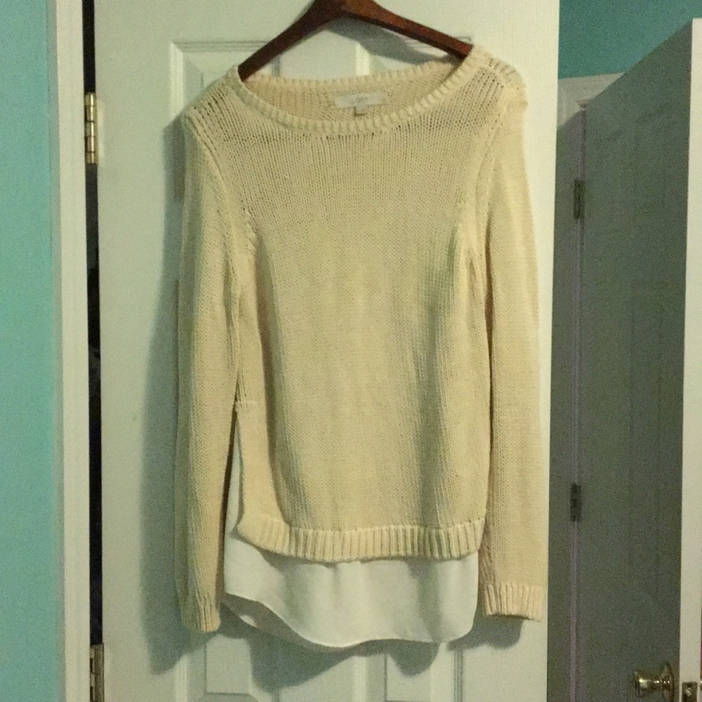 tan sweater